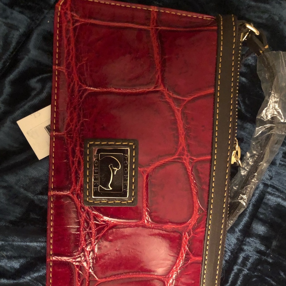 Dooney and Bourke red leather clutch